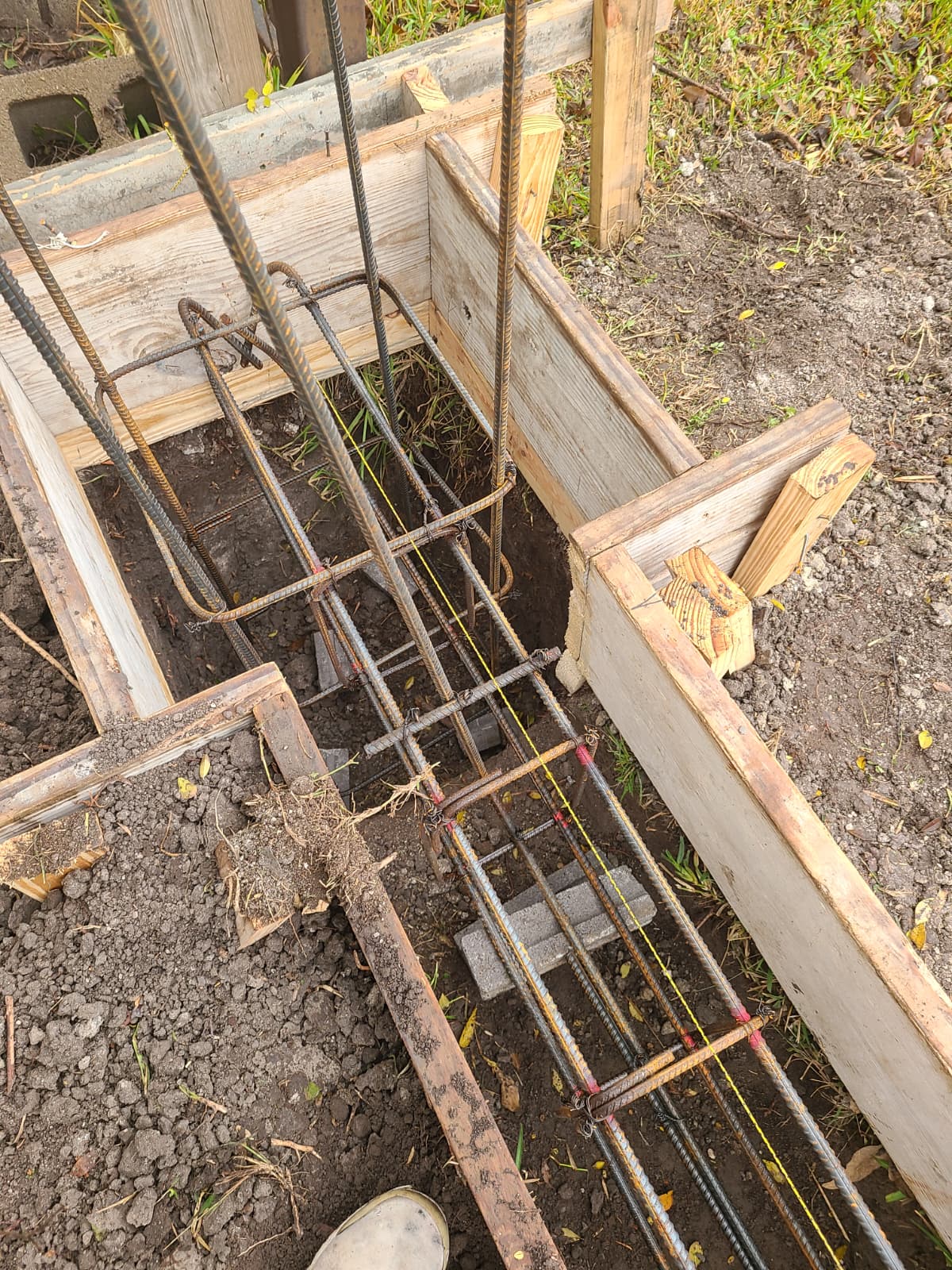 Rebar cage at corner of footing ready for concrete