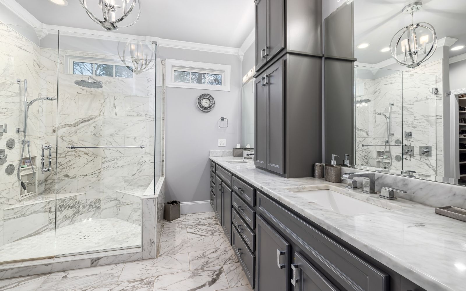 Modern bathroom remodeling project in Houston, TX with walk-in shower and warm lighting